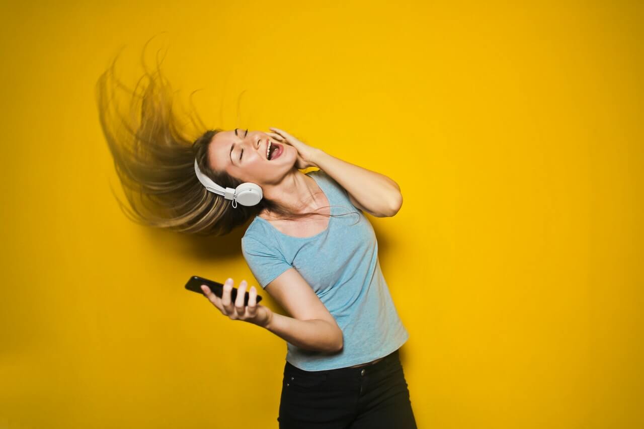 Woman dancing to music